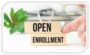 wooden blocks with 'open enrollment' written on them