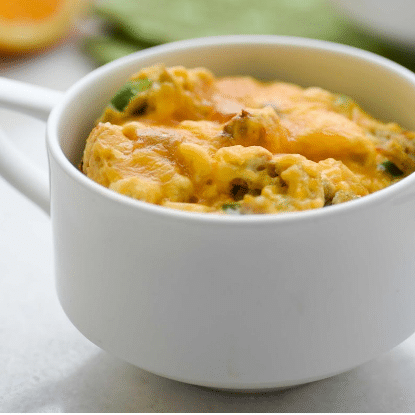 yellow omelet in a white mug