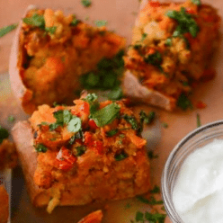 small sweet potato bites with sour cream on the side